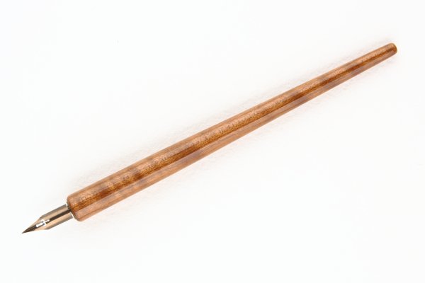 Straight pen holder made of steamed curly American Cherry.