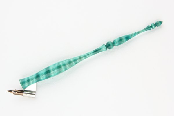 Oblique pen holder made of dyed Curly American Maple wood.