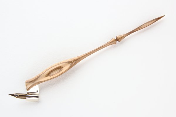 Oblique pen holder made of Zebrano wood.