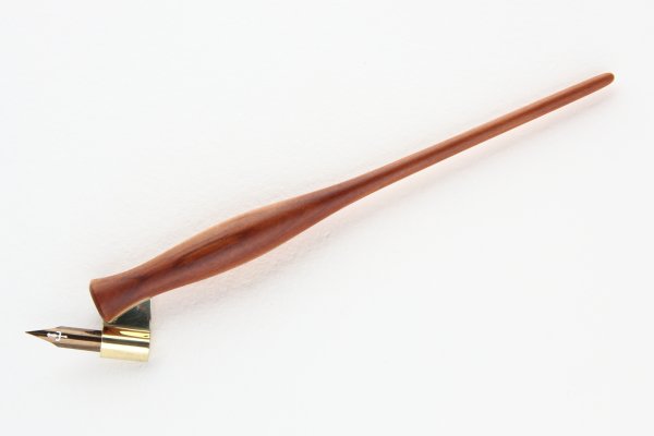 Classic shaped oblique pen holder made of Plum Wood.