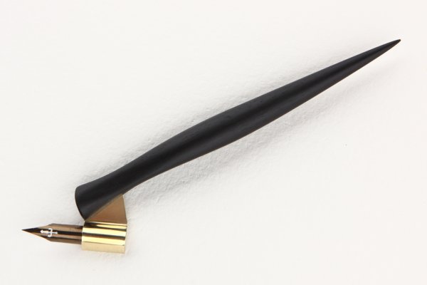 Ergonomic oblique pen holder made of African Ebony.