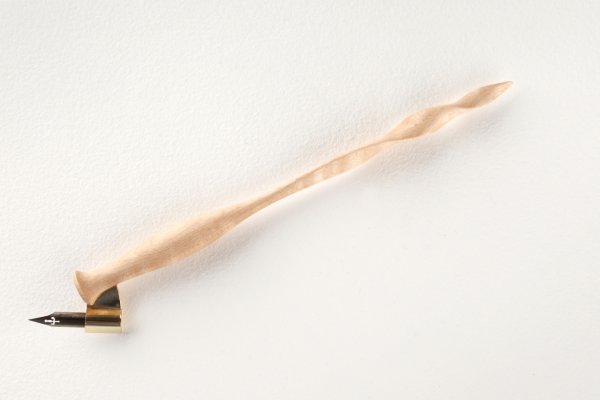 Oblique pen holder with hand carved tail, made of curly Sycamore Maple wood